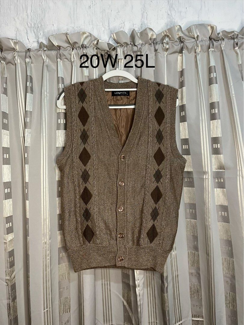 Vintage Argyle Vest (Category: Vests) located in Cabanatuan. Submitted by clintjosep46618 (Listing ID 1437495466, Image 1). Description: - Vintage argyle vest - Classic button-down design - Features a V-neck - Textured fabric - Neutral brown color with darker brown diamond accents - Brand: LONPITL - Size: 20W 25L.