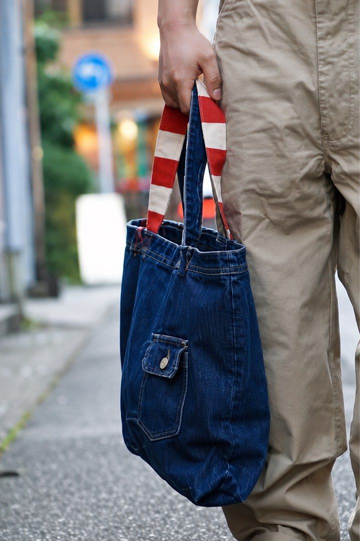 VISVIM - S/S18 SPOT DRY DENIM TOTE BAG (Category: Sling Bags) located in Cavite. Submitted by _Gizmo (Listing ID 1437484106, Image 1). Description: Visvim - S/S18 Spot Dry Denim Tote Bag Made from specially processed denim Dry shrink processed Custom blue selvedge outseam Measurement Width: 14.5’ Inch Length: 15.5’ Inch Depth: 3.5’ Inch Handle: 10’ Inch Used | Very good condition Material: 100% Cotton Made In Japan.