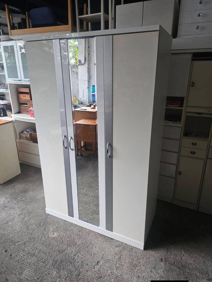 Wardrobe (Category: Shelves, Cabinets & Racks) located in Meycauayan. Submitted by marygracecasimiro (Listing ID 1437581328, Image 3). Description: Wardrobe Cabinet‼️₱15,500‼️ ✔️L-47.5 H-75 W-21.5 Inches 📐 ✔3 Doors and 2 Shelves 🗄 ✔️Laminated 🔖 ✔️Compress and Mdf Back🪵 ✔Scratches As-is! 👌💚.