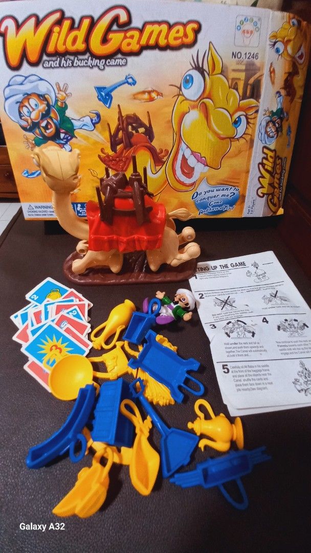 Wild Games and His Bucking Game (Category: Board Games & Puzzles) located in Quezon City. Submitted by houseofdecluttering (Listing ID 1437455931, Image 1). Description: - Wild Games board game - Includes game board, cards, and game pieces - Includes instructions - Box has some wear - Classic game for fun!.