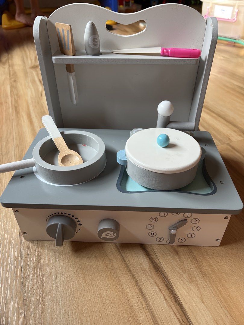 Wooden Toy Kitchen Set montessori (Category: Educational & Learning Toys) located in Quezon. Submitted by smallville.ph (Listing ID 1437481513, Image 1). Description: Selling low Orig price 1400 - Wooden toy kitchen set - Includes stove, pan, pot, and utensils - Features adjustable knobs - Comes with a storage shelf - Neutral color design - Encourages imaginative play #montessori #montessoriph.