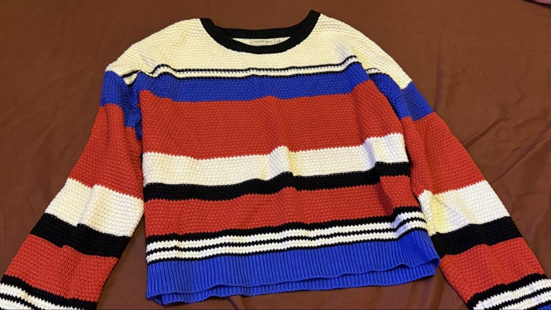 YISHION CASUAL Striped Sweater (Category: Longsleeves) located in Quezon City. Submitted by shejyy (Listing ID 1437410912, Image 2). Description: YISHION Casual Striped Sweater - Size S. Features a round neck, long sleeves, and ribbed hem. Color: White, Red, Blue, Black. Knitted material..