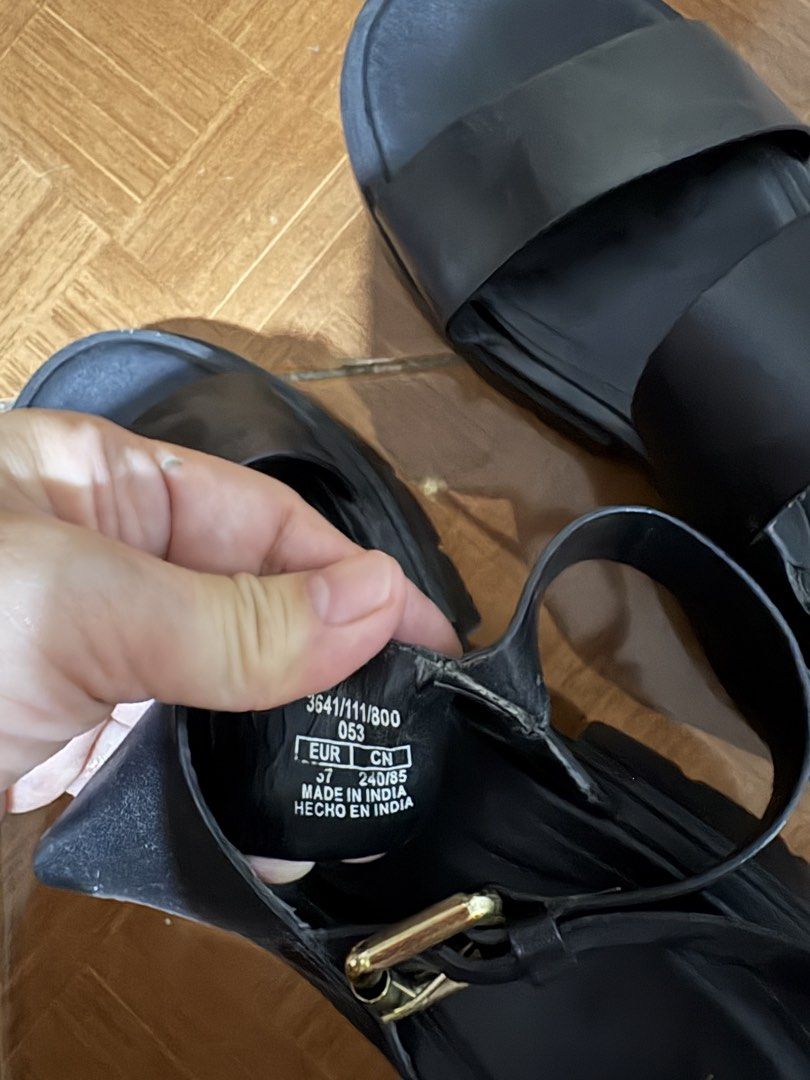 Zara Black Platform Sandals (Category: Flats & Sandals) located in Quezon City. Submitted by brandedthingsforless (Listing ID 1437517012, Image 3). Description: - Zara black platform sandals - Size: 37 EUR - Features: Buckle closure, thick sole - Color: Black - Made in India - Condition: Some wear on soles and leather .