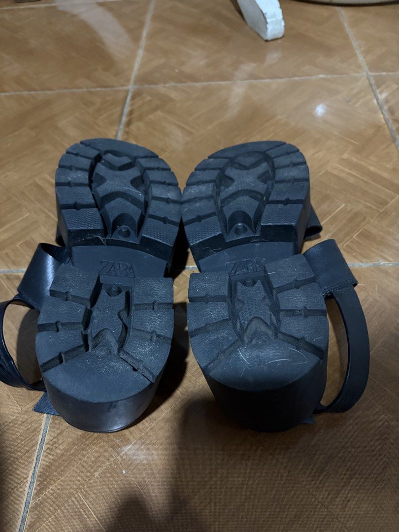 Zara Black Platform Sandals (Category: Flats & Sandals) located in Quezon City. Submitted by brandedthingsforless (Listing ID 1437517012, Image 2). Description: - Zara black platform sandals - Size: 37 EUR - Features: Buckle closure, thick sole - Color: Black - Made in India - Condition: Some wear on soles and leather .