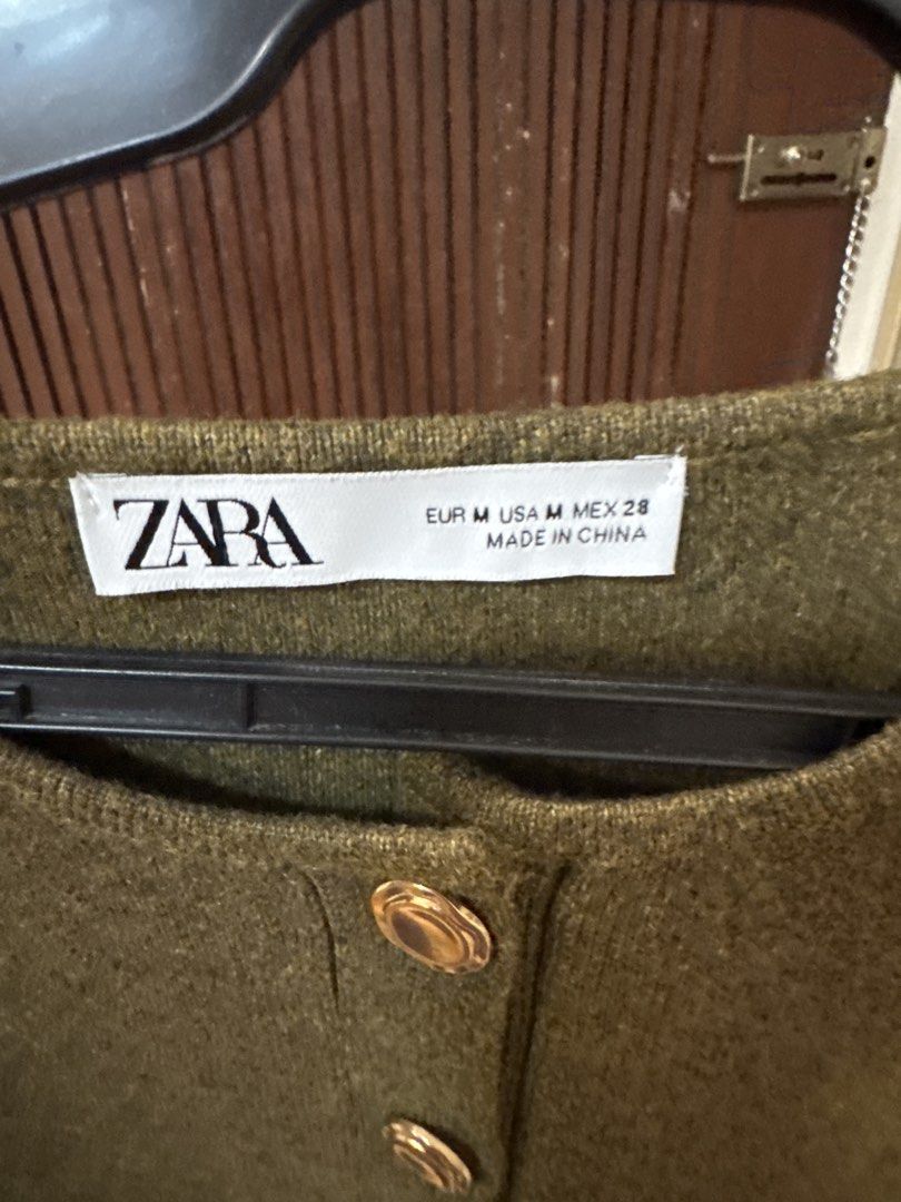 Zara Sleeveless Dress (Category: Dresses) located in Manila. Submitted by stormy28 (Listing ID 1437518892, Image 3). Description: - Zara olive green sleeveless dress - Size: Medium - Features: - Round neckline - Decorative gold buttons - Flared hem.