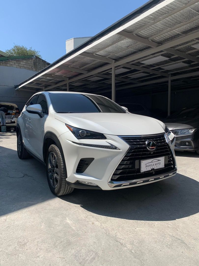 2018 Lexus Nx300 2.0L (Category: Used Cars) located in Pasig City. Submitted by mad_cars (Listing ID 1437592592, Image 2). Description: 2018 LEXUS NX300 2.0L GAS AUTOMATIC TRANSMISSION ₱1,188,000 Pearl White 3 ending plate 49tkms mileage Automatic Transmission 2.0L Gasoline Engine LED Headlights with DRL Signature Lexus Spindle Grille LED Tail Lights Front Suspension: MacPherson Strut Rear Suspension: Double Wishbone Front Brakes: Ventilated Disc