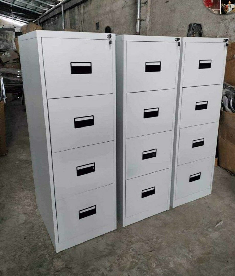 4-Drawer Filing Cabinet (Category: Office Furniture & Fixtures) located in Manila. Submitted by jerrymieborda05 (Listing ID 1437745683, Image 1). Description: - 4-drawer filing cabinet - Made of durable metal - Features a security lock - Easy-access handles on each drawer - Ideal for office or home use - Neutral color.