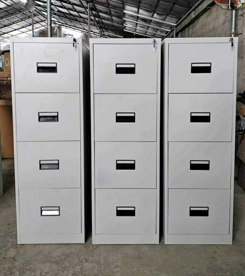 4-Drawer Filing Cabinet (Category: Office Furniture & Fixtures) located in Manila. Submitted by jerrymieborda05 (Listing ID 1437745683, Image 2). Description: - 4-drawer filing cabinet - Made of durable metal - Features a security lock - Easy-access handles on each drawer - Ideal for office or home use - Neutral color.
