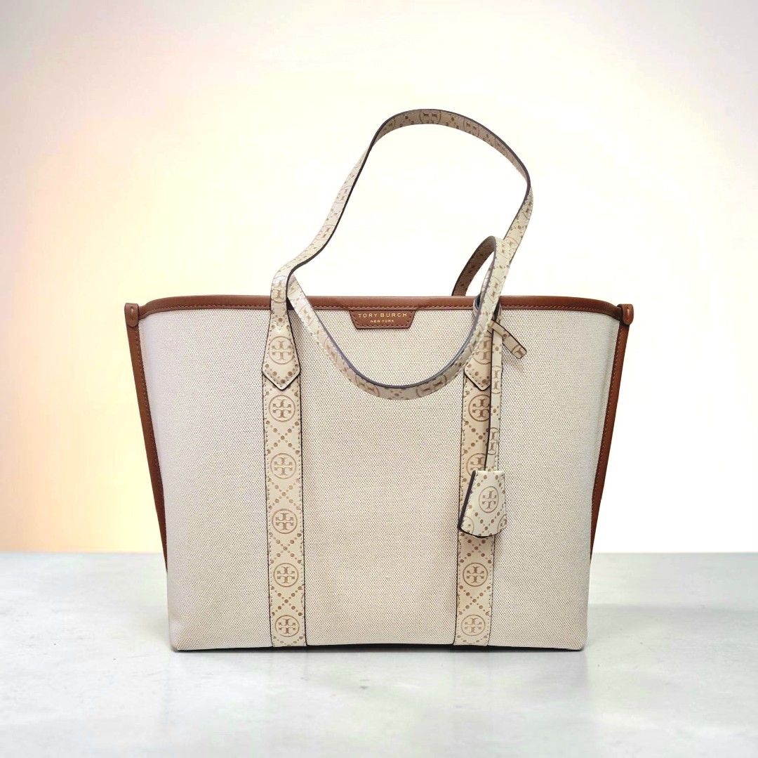 💯 Tory Burch Perry Canvas Triple-Compartment Tote (Category: Luxury Bags & Wallets) located in Mandaluyong City. Submitted by arlene2560 (Listing ID 1437716454, Image 2). Description: 💯 Authentic Tory Burch Perry Canvas Triple Compartment Tote bag in a natural cream color with brown leather trim. New, with dustbag. Retails at 32k in Rustan's. Decluttering low at 21k. Mandaluyong - Tory Burch tote bag - Canvas body with leather trim - Triple-com