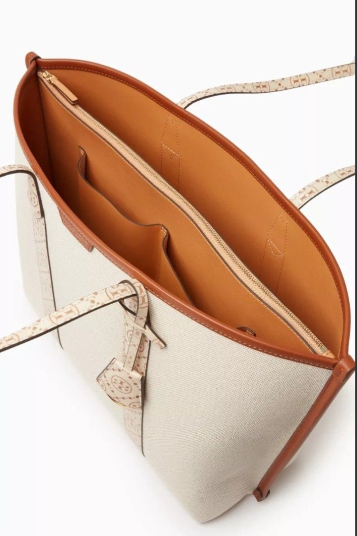 💯 Tory Burch Perry Canvas Triple-Compartment Tote (Category: Luxury Bags & Wallets) located in Mandaluyong City. Submitted by arlene2560 (Listing ID 1437716454, Image 3). Description: 💯 Authentic Tory Burch Perry Canvas Triple Compartment Tote bag in a natural cream color with brown leather trim. New, with dustbag. Retails at 32k in Rustan's. Decluttering low at 21k. Mandaluyong - Tory Burch tote bag - Canvas body with leather trim - Triple-com