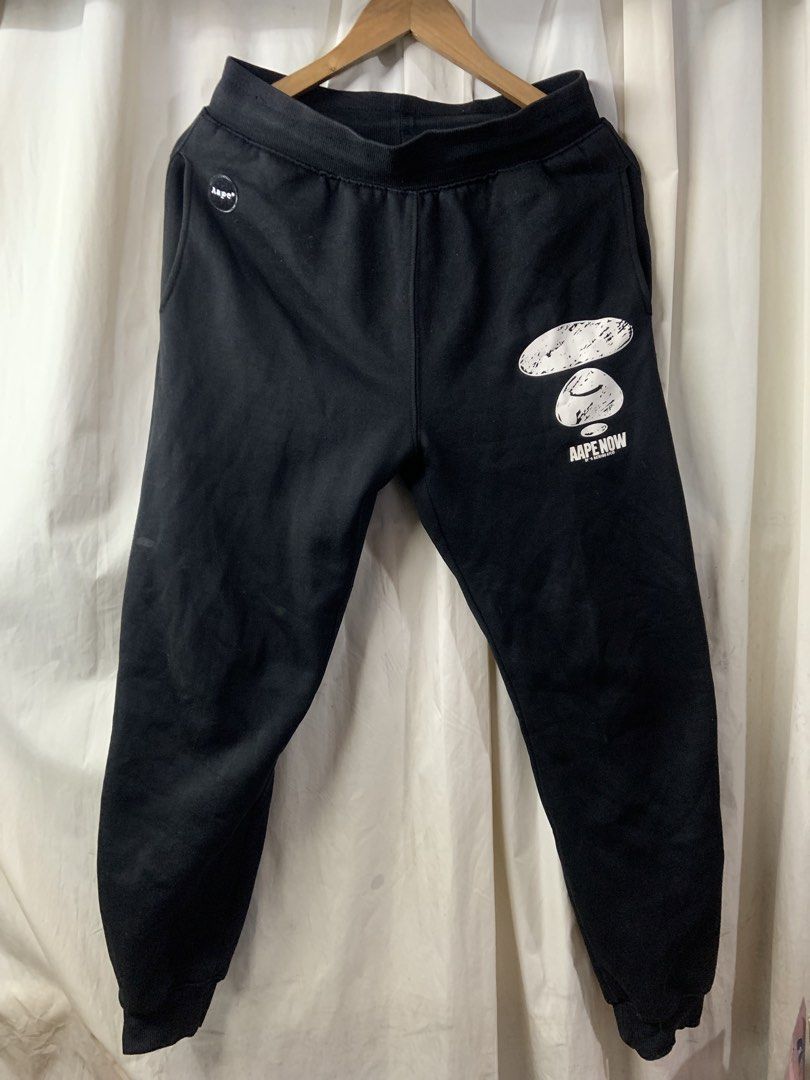 AAPE Y2K PANTS (Category: Joggers) located in Paranaque City. Submitted by thrift_in_the_hoods (Listing ID 1437675771, Image 1). Description: Aape jogger Waist: 30-32 Length: 37 Condition: Good Location: Parañaque, San Isidro.