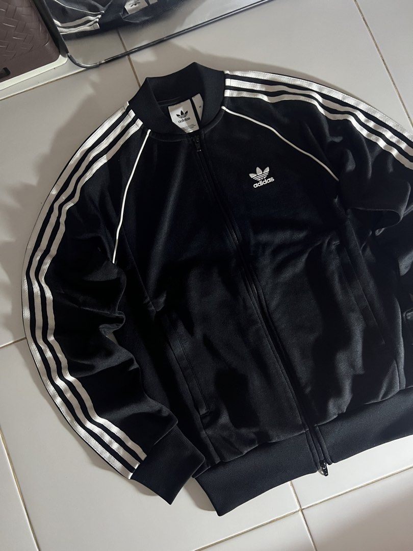 Adidas Adicolor Classics SST track jacket black (Category: Coats, Jackets and Outerwear) located in Manila. Submitted by metromnlwear (Listing ID 1437755862, Image 2). Description: W:20” L:26” [Medium on tag fit to large No Issue Color Rate: 10/10 Condition: EXCELLENT to AS NEW.