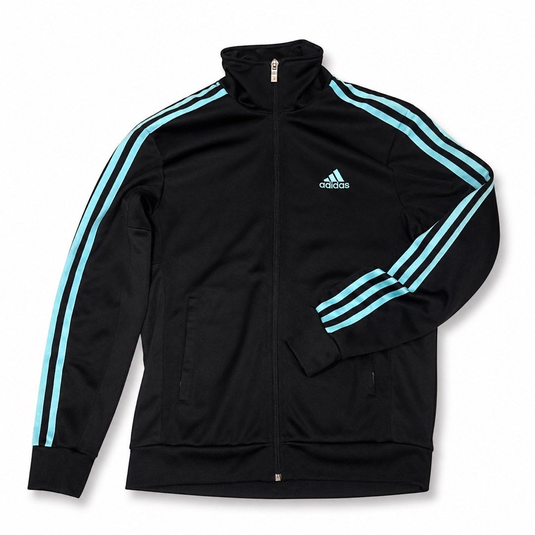 Adidas jacket (Category: Coats, Jackets and Outerwear) located in Manila. Submitted by madspau (Listing ID 1437732504, Image 3). Description: This black Adidas track jacket with icy blue stripes gives the perfect mix of sporty, vintage, and effortlessly cool. Styled with cozy essentials and creative vibes, this find proves you don’t need a huge budget to look iconic..