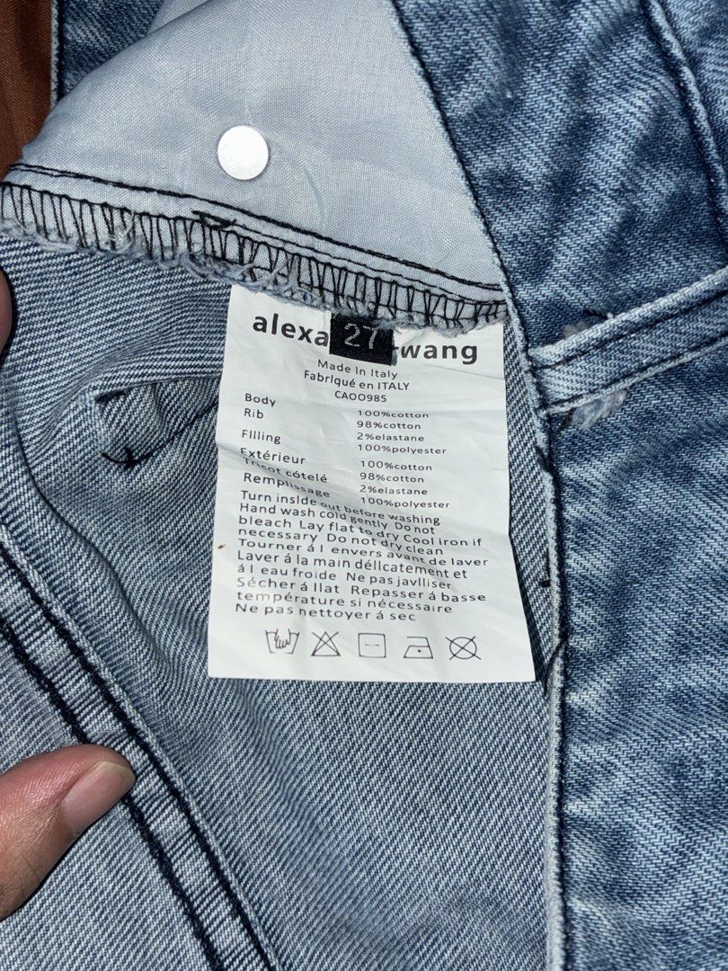 Alexander Wang Assymetrical Denim Mini Skirt (Category: Skirts) located in Quezon City. Submitted by _stphnlswardrobe (Listing ID 1437695637, Image 2). Description: Brand: Alexander Wang Size: 27 on tag; 30” measured with a measuring tape Condition: Like New Note: Open to Negotiations but no lowballing!! MOD: Lalamove, GGX ONLY MOP: GCash, Maya ONLY.