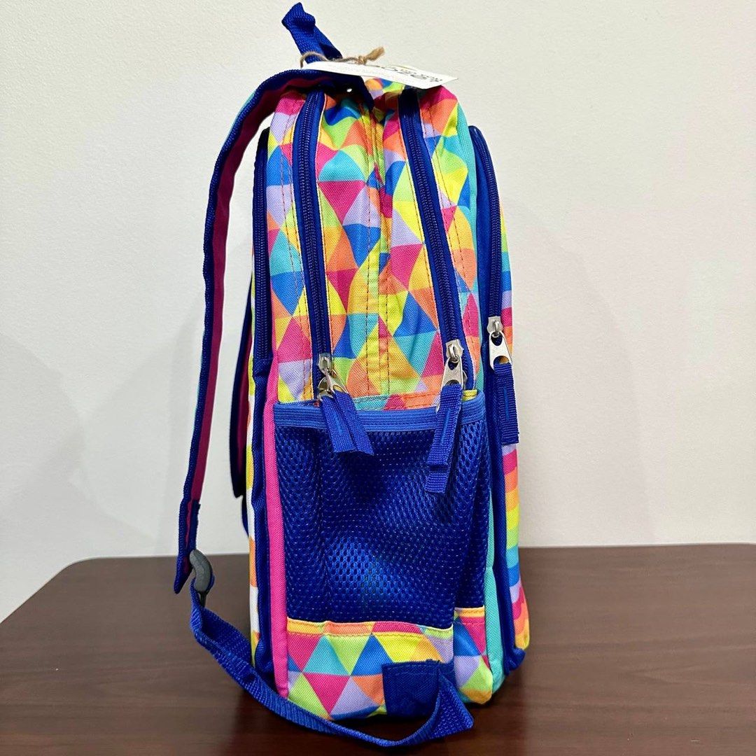 [Authentic] Chooze Reversible Kids Backpack Rainbow Waves & Heart Drops Print Small (Category: Backpacks) located in Quezon City. Submitted by brandedusagoodies (Listing ID 1437639045, Image 3). Description: Bright and playful Chooze reversible kids backpack featuring colorful rainbow wave stripes on one side and rainbow heart drop prints on the other for two fun looks in one bag. Made with durable water-resistant material and padded straps for c