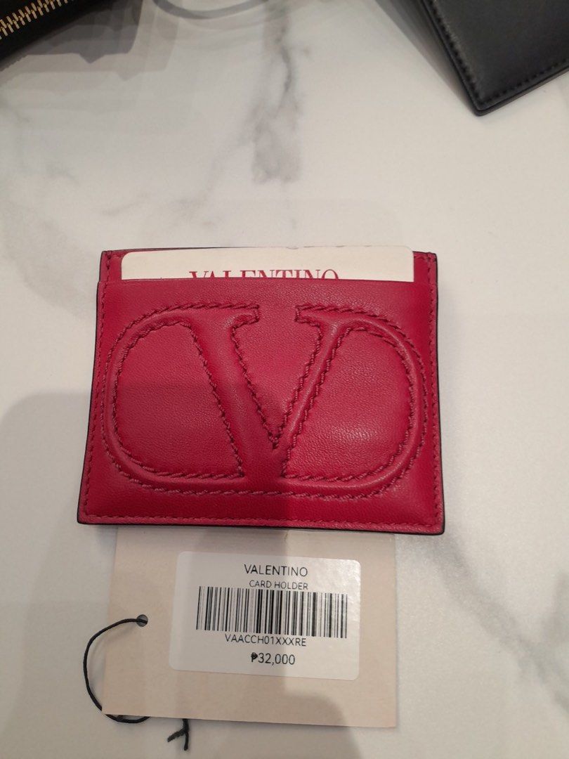 Balenciaga Zip Card Coin Holder (Category: Luxury Bags & Wallets) located in Caloocan City. Submitted by imeldas (Listing ID 1437634317, Image 2). Description: - Authentic Balenciaga Zip Card Coin Holder. - Features the iconic Balenciaga logo. - Includes card slots and a zip compartment for coins. - Compact and stylish design..