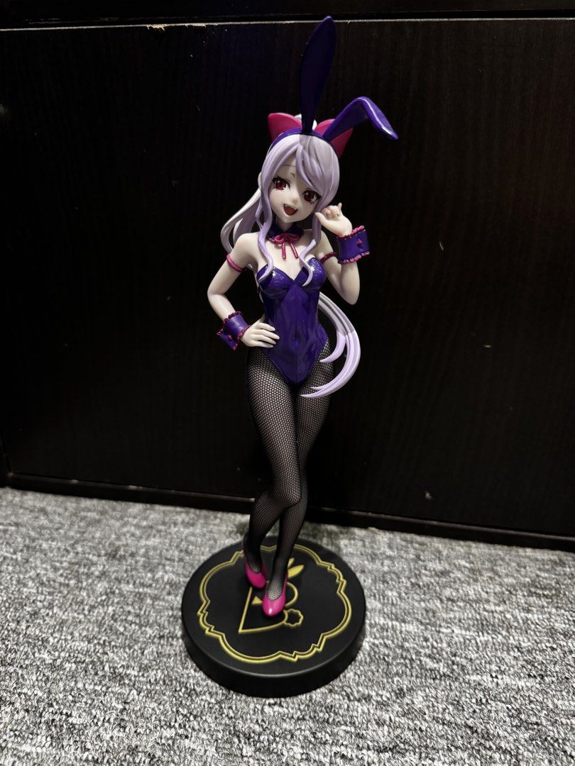 Bicute Bunnies Shalltear (Category: Figurines & Statues) located in President Roxas. Submitted by isserminator (Listing ID 1437608903, Image 1). Description: - Anime figure: Bunny girl - Color: Purple outfit, white hair - Pose: Dynamic, one hand raised - Base: Black with gold accents - Details: Fishnet stockings, pink heels - Condition: Well-detailed and crafted.