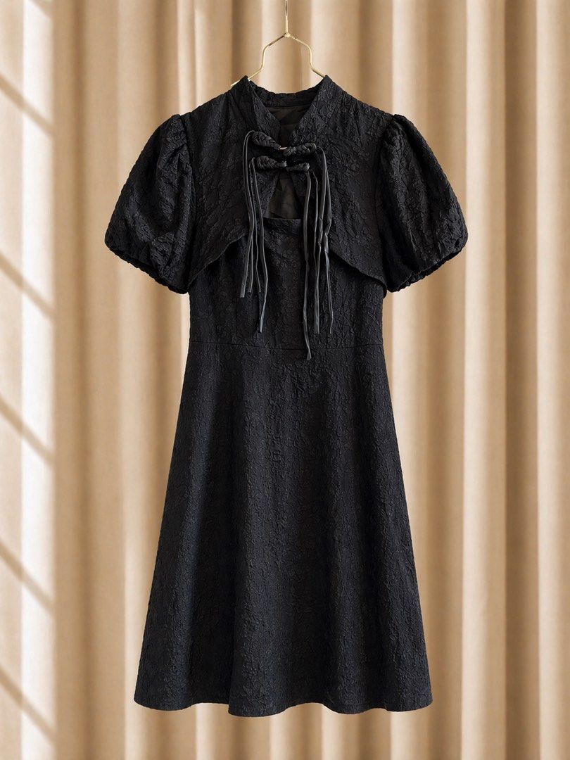 Black Dress with Bolero (Category: Dresses) located in Batangas. Submitted by nicki0001 (Listing ID 1437685459, Image 2). Description: - Black dress with matching bolero - Textured fabric - Flattering A-line silhouette - Bolero with short, puffy sleeves - Unique tie detail at neckline - Versatile for special occasions or a stylish night out.