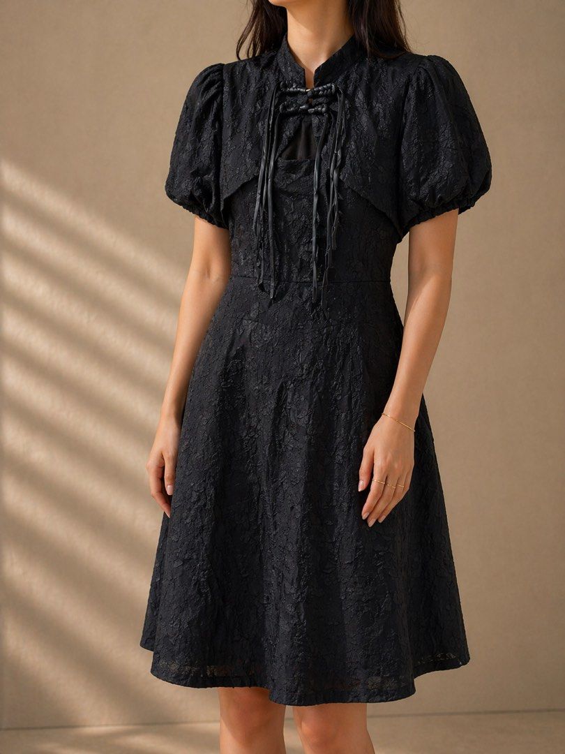 Black Dress with Bolero (Category: Dresses) located in Batangas. Submitted by nicki0001 (Listing ID 1437685459, Image 1). Description: - Black dress with matching bolero - Textured fabric - Flattering A-line silhouette - Bolero with short, puffy sleeves - Unique tie detail at neckline - Versatile for special occasions or a stylish night out.