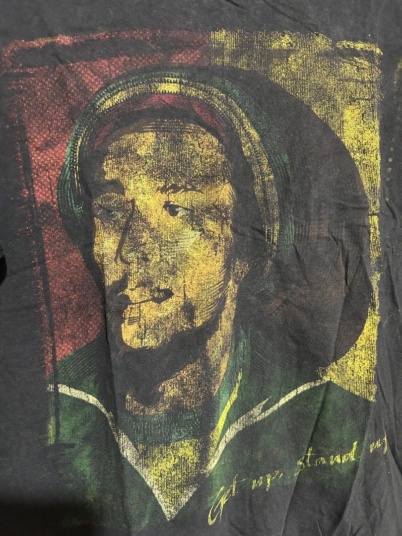 Bob Marley Get Up Stand Up Shirt (Category: Tshirts & Polo Shirts ) located in Tarlac. Submitted by nothingbutlesthrift (Listing ID 1437671290, Image 2). Description: Issues: Faded prints, faded shirt, cracks, pinhole No tag ₱150.