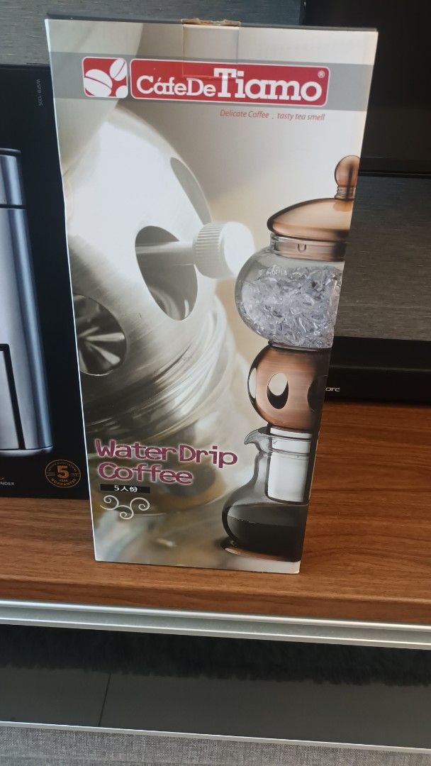 Cafe De Tiamo Water Drip Coffee Maker (Category: Coffee Machines & Makers) located in Mandaluyong City. Submitted by bestill4610 (Listing ID 1437747720, Image 3). Description: - Cafe De Tiamo Water Drip Coffee Maker for cold brew coffee.⁰ - Slow drip "kyoto style" - Features a glass carafe. - Durable stainless steel frame. - Includes a water drip control valve. - Makes 5 cups (600ml) - Silver - Brand new/never used.
