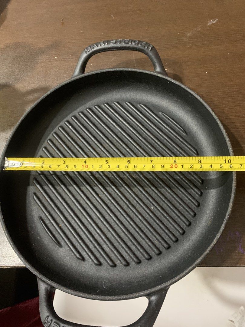 Cast iron Grill pan (Category: Other Kitchenware & Tableware) located in Manila. Submitted by akotisay (Listing ID 1437655590, Image 3). Description: FOR SALE CAST IRON GRILL PAN 26 cm With minor scratch inside Taguig City location Pm or txt 09957525547 1799 pesos.