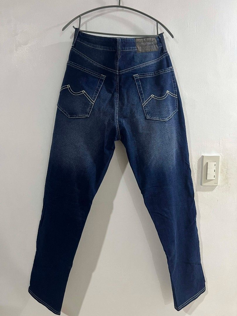 Chevignon Comfort Taffin Jeans (Category: Jeans) located in Quezon City. Submitted by silverforest_0cab92 (Listing ID 1437676784, Image 2). Description: - Chevignon dark blue jeans - Size: 32 - Classic five-pocket design - Button closure with brand engraving - Two back pockets - Leather brand patch -32X38.
