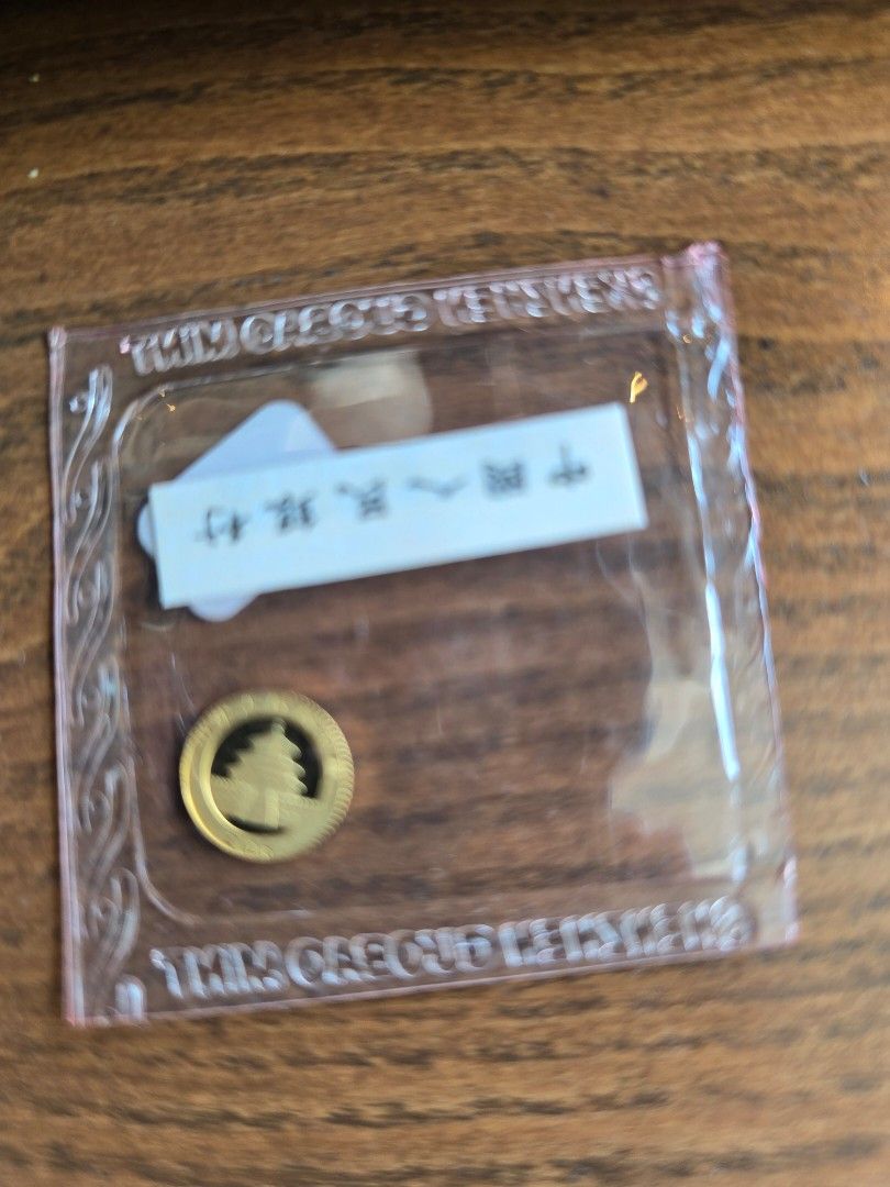 Chinese Gold Coin (Category: Currency) located in Manila. Submitted by ildnumde (Listing ID 1437681175, Image 1). Description: - Authentic Chinese gold coin - Sealed in a clear protective case - Features a beautiful tree design on one side - Adorable panda design on the other side - Includes a tag with Chinese characters - Ideal for coin collectors and enthusiasts 1 gram 99.9 gold Dasmarinas Cavite.