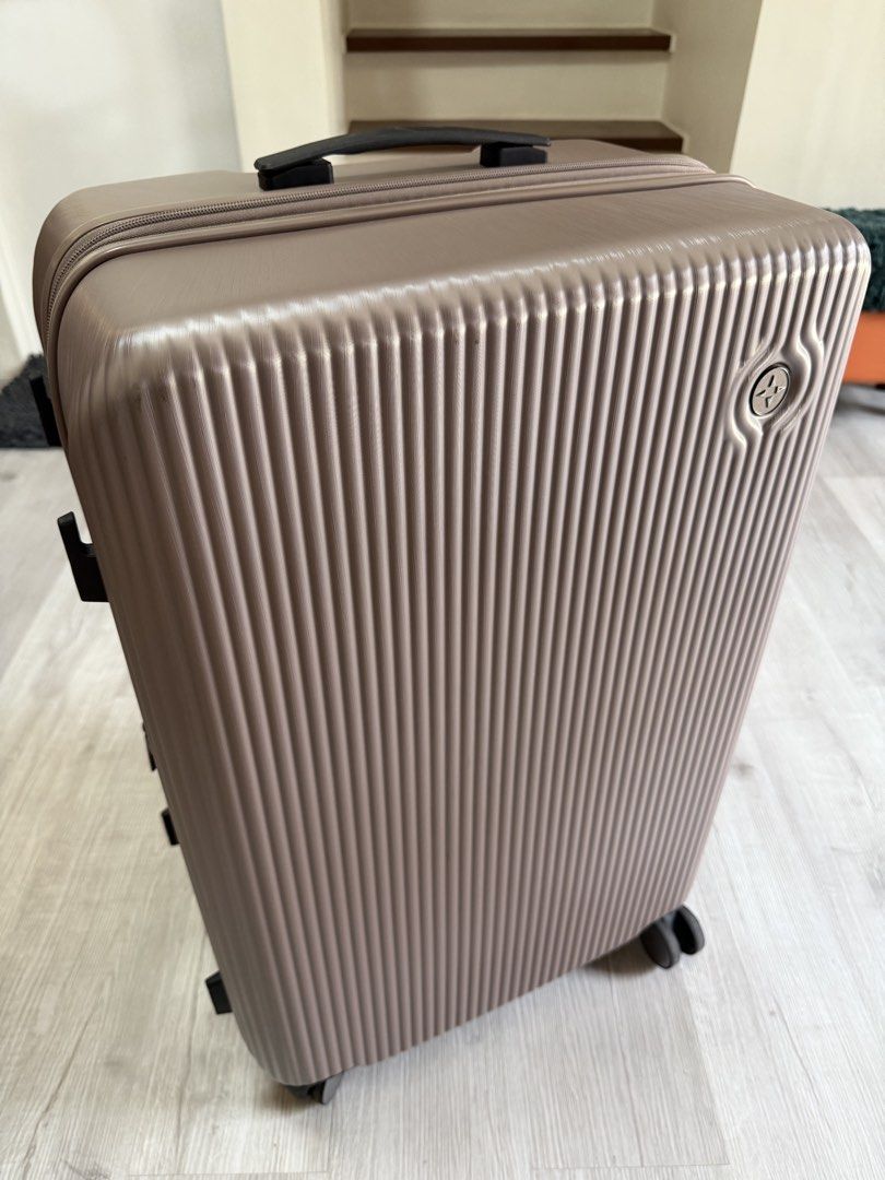 CLOSET CLEAN UP! World Traveller Brown Hardcase Luggage with Expandable Zipper (Category: Luggage) located in Bacoor. Submitted by dizonloue22069 (Listing ID 1437619917, Image 2). Description: - Durable brown hardcase luggage - Textured exterior - Top handle and wheels for easy transport - Expandable zipper for extra packing space - Secure closure system - Perfect for travel - Bought for 7k on sale! - Used once in my recent EU travel only. With l