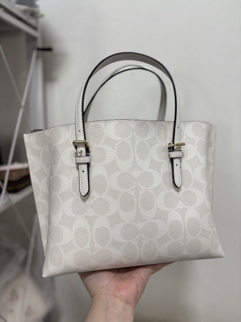 Coach mollie white signature (Category: Luxury Bags & Wallets) located in Quezon City. Submitted by aloracollections_ (Listing ID 1437720741, Image 2). Description: .