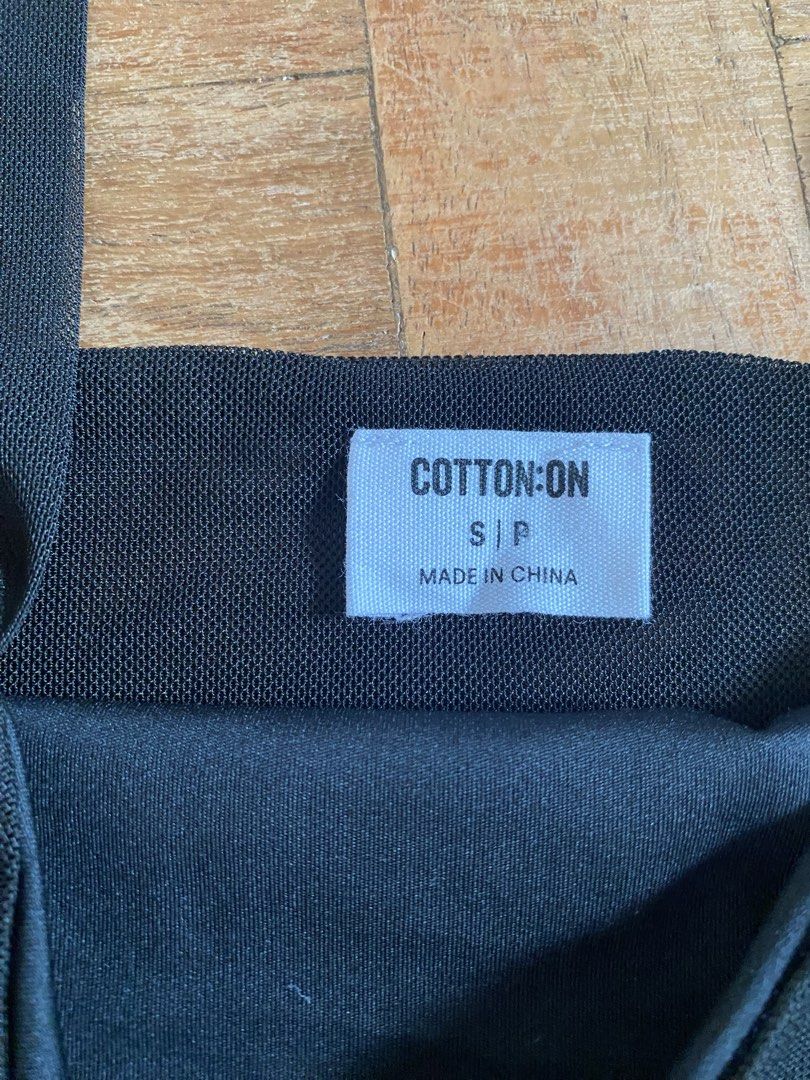 Cotton On Black Tank Top S (Category: Sleeveless) located in Manila. Submitted by boomboomshakataka (Listing ID 1437664647, Image 2). Description: - Cotton On black tank top - Size: S - Features a square neckline - Wide straps - Solid black color - Lightweight material - Made in China.