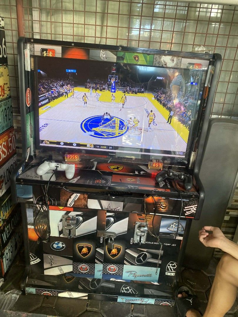 Custom Arcade Machine with Games (Category: Others) located in Manila. Submitted by onlinethriftocean (Listing ID 1437620893, Image 2). Description: - FOR SALE PS4 AND XBOX 360 -Custom-built arcade machine - Large screen - Loaded with multiple games - Includes two controllers - Decorated with car-themed graphics - Ready to play - Great for home or business use PARA SA MGA GUSTO MAG BUSINESS DYAN ITO BAKA GUSTO NIYO 👌 SWAK NA SWAK TO SASAKSAK NIY
