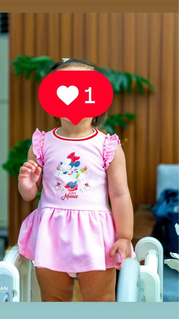 Disney Baby Minnie Mouse Dress Set (Category: Babies & Kids Fashion) located in General Trias. Submitted by irncstnd (Listing ID 1437600675, Image 3). Description: - Adorable baby dress set. - Features a pink dress with Minnie Mouse design. - Includes matching bloomers. - Dress has ruffled sleeves and 'Love Minnie' print. - Designed for babies aged 6-12 months. - Dress has red and white trim. - Made of textured fabric..