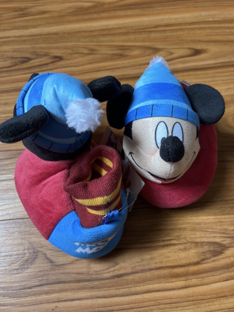 Disney Mickey Mouse Slippers Size 5-6 (Category: Babies & Kids Fashion) located in Cavite. Submitted by putenten (Listing ID 1437611107, Image 2). Description: - Mickey Mouse slippers - Size: 5-6 - Features a red and blue design - Mickey's face on top - Non-slip sole - Keeps feet warm and cozy - Great for Disney fans!.