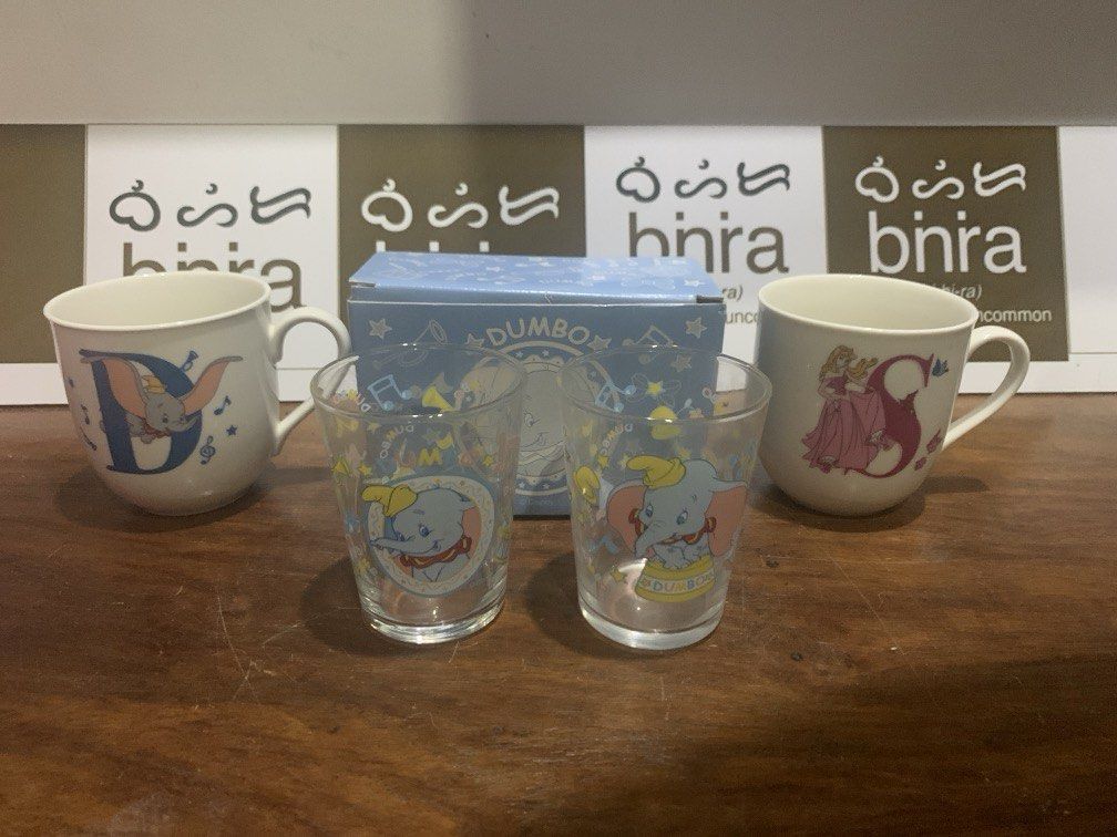 Dumbo / Sleeping Beauty - Mug and Glass (Category: Coffee & Tea Tableware) located in Carmona. Submitted by bihira (Listing ID 1437693297, Image 1). Description: Dumbo / Sleeping Beauty - Mug and Glass - Authentic Fan Merch - Disney - WYSIWYG - Mugs - w/o box - Dumbo Glass - with OG Box.