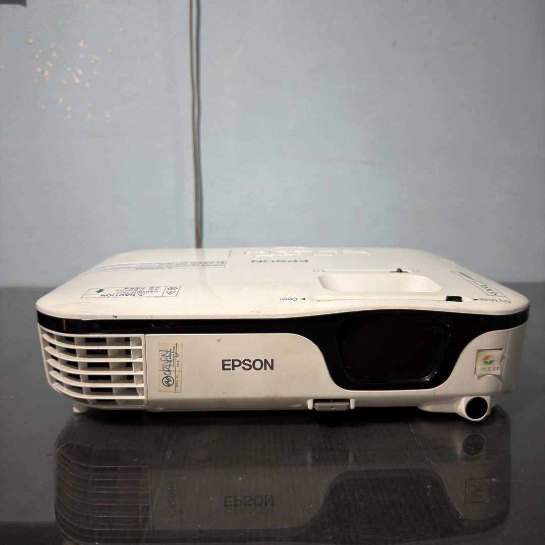 Epson EB-S12 Screen Projector (Category: Projectors) located in Valenzuela. Submitted by declutterwithmrll (Listing ID 1437645270, Image 1). Description: For Sale: EPSON EB-S-12 Projector RFS: Not used anymore Location: Brgy. 169, Caloocan Epson EB-S12 projector. Features multiple input ports including S-Video, Video, Type A, Type B, and Computer. Includes a power input and a VGA port. The projector has control buttons on top for menu, source sea