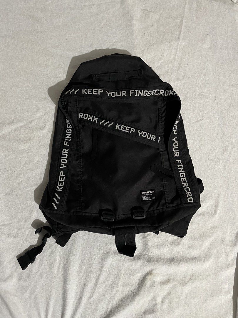 FINGERCROXX backpack with white logo branding tape (Category: Backpacks) located in Quezon City. Submitted by cgoodsupply (Listing ID 1437642262, Image 1). Description: FINGERCROXX backpack with white logo branding tape. no issue color rate 10/10 qc location.