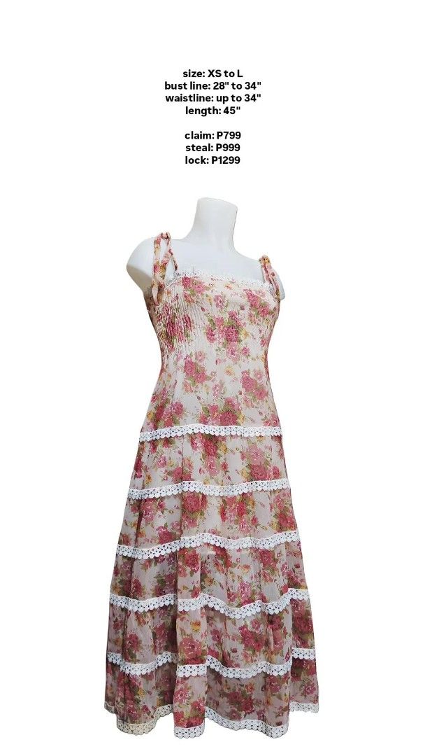 floral tiered dress (Category: Dresses) located in Manila. Submitted by hezzy.ph (Listing ID 1437633263, Image 2). Description: Stunning floral dress with a tiered design, square neckline, and adjustable straps. Features a smocked bodice and lace detailing. Fits XS to L Bust: 28"-34" Waist: up to 34" Length: 45".