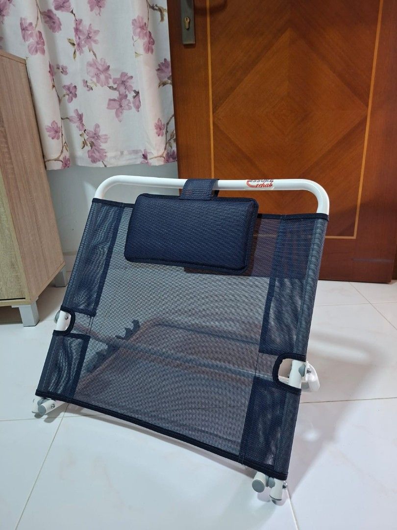 Foldable backrest (Category: Bedding & Towels) located in Singapore. Submitted by miss-misc (Listing ID 1437612656, Image 1). Description: Condition: 10/10 Solid construction, epoxy coated frame, mesh fabric for added, breathability and easy cleaning,5 adjustable angles (25 to 75 degrees), folds flat for easy storage Self pick up or arrange own delivery.