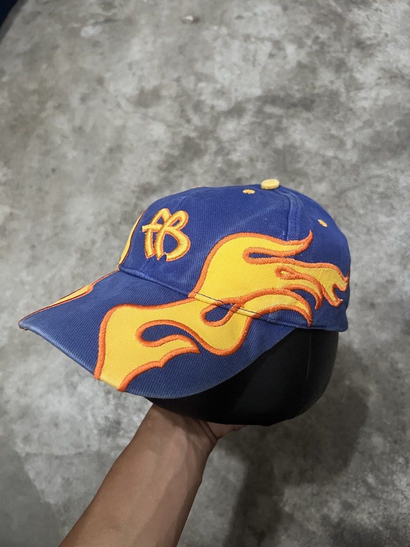 FUBU Racing Flame Velcro Cap (Category: Caps & Hats) located in Naga. Submitted by nowhere_archive_shop (Listing ID 1437722114, Image 3). Description: FUBU Racing Flame Velcro Cap Slightly crack brim Good Condition Sign of usage DM.