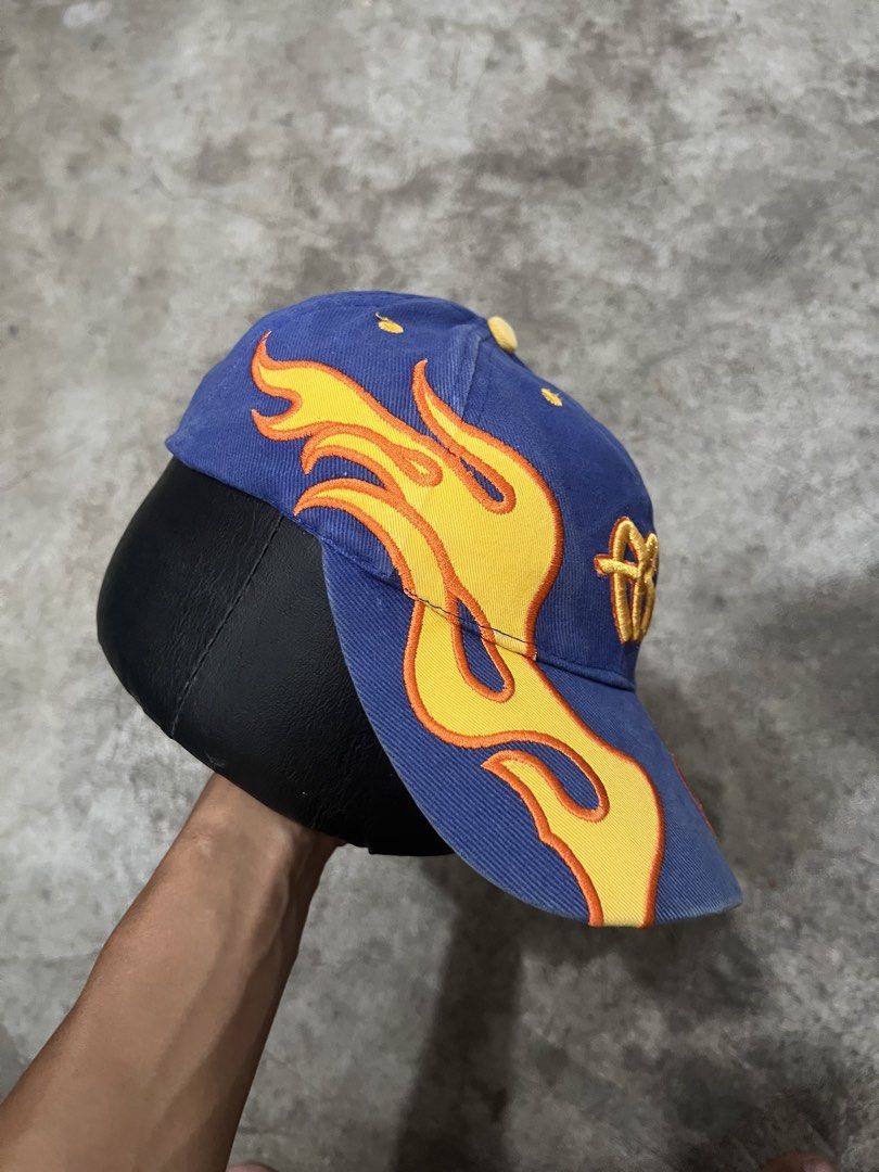 FUBU Racing Flame Velcro Cap (Category: Caps & Hats) located in Naga. Submitted by nowhere_archive_shop (Listing ID 1437722114, Image 2). Description: FUBU Racing Flame Velcro Cap Slightly crack brim Good Condition Sign of usage DM.
