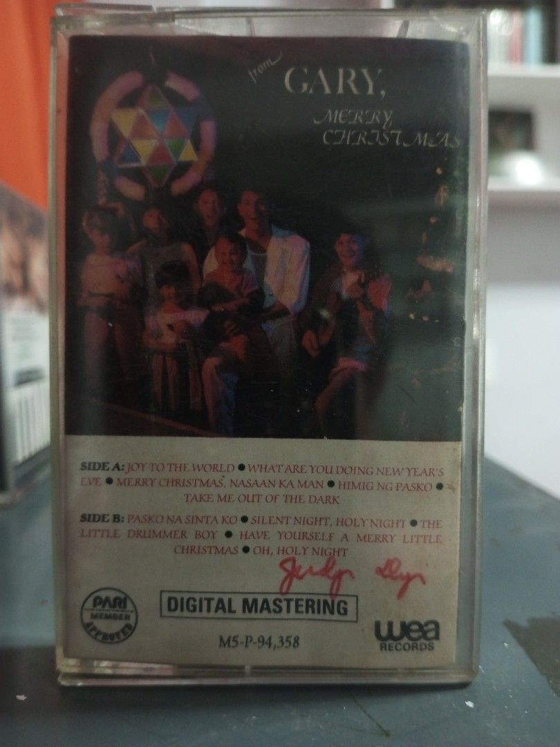 Gary V. Merry Christmas Cassette Tape (Category: Vintage Collectibles) located in Manila. Submitted by jrdee69 (Listing ID 1437603518, Image 1). Description: - Original Gary V. "Merry Christmas" cassette tape - Features classic Christmas songs (e.g., "Pasko Na Sinta Ko ", Joy to the World", "Silent Night", "Oh, Holy Night") - Includes original case and cover art - Digitally mastered by WEA Records - Perfect for collectors!.