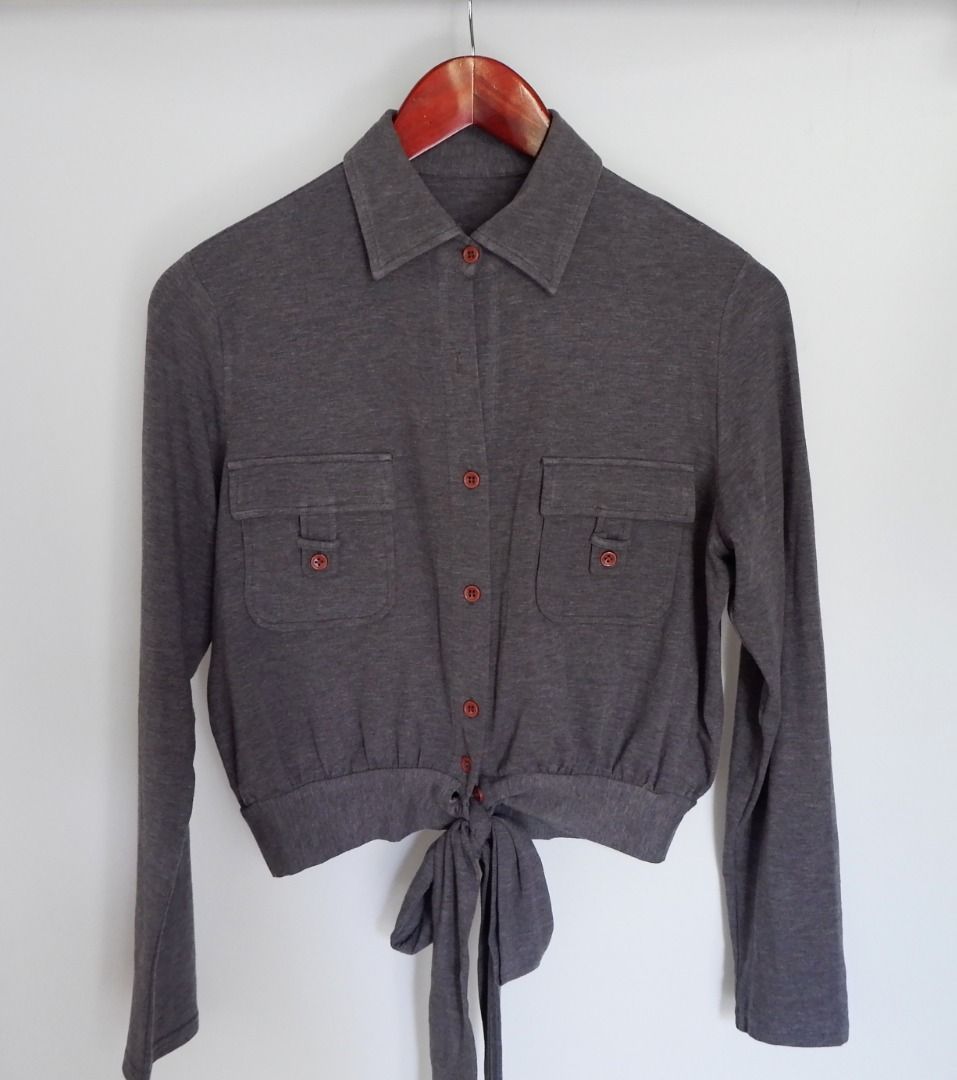 Grey Cropped Utility Tie-Front Long Sleeve Blouse (Category: Longsleeves) located in San Juan City. Submitted by olispace (Listing ID 1437625232, Image 1). Description: Grey Cropped Utility Tie-Front Long Sleeve Blouse 🌷Condition: 9/10 —RFS: Decluttering 🧺 📍Brgy. Balong-bato, San Juan City MOP: Gcash MOD: Lalamove.