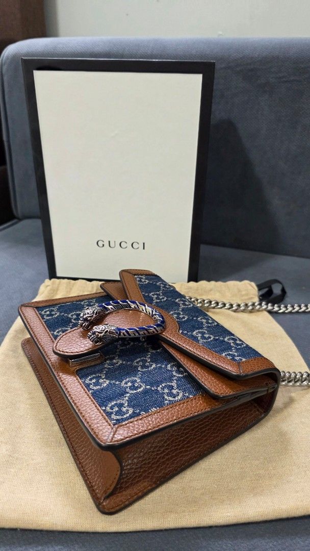 Gucci Dionysus Denim Shoulder Bag (Category: Luxury Bags & Wallets) located in Taguig. Submitted by yaneegirl_118 (Listing ID 1437698153, Image 3). Description: - Authentic Gucci Dionysus shoulder bag - Denim GG Supreme canvas with brown leather trim - Features chain strap - Iconic tiger head closure - Includes original box, dust bag, and authenticity cards - Stylish and recognizable design - used twice only - money back guarantee.