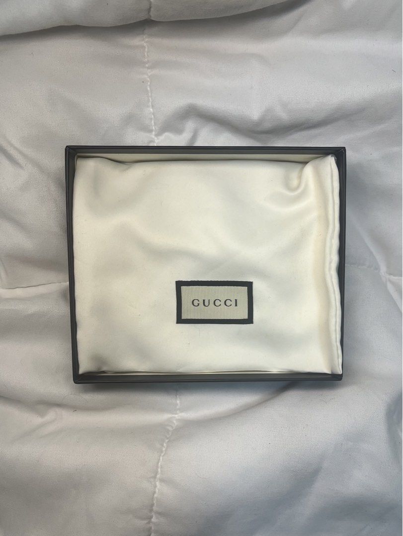 Gucci GG Marmont Card Case (Category: Luxury Bags & Wallets) located in Manila. Submitted by caleb.apo (Listing ID 1437729801, Image 3). Description: - Authentic Gucci card case - Black leather - Iconic GG logo - Zip closure - Card slots - Zippered compartment - Includes: Original box, dust bag, authenticity cards, and original price tag.