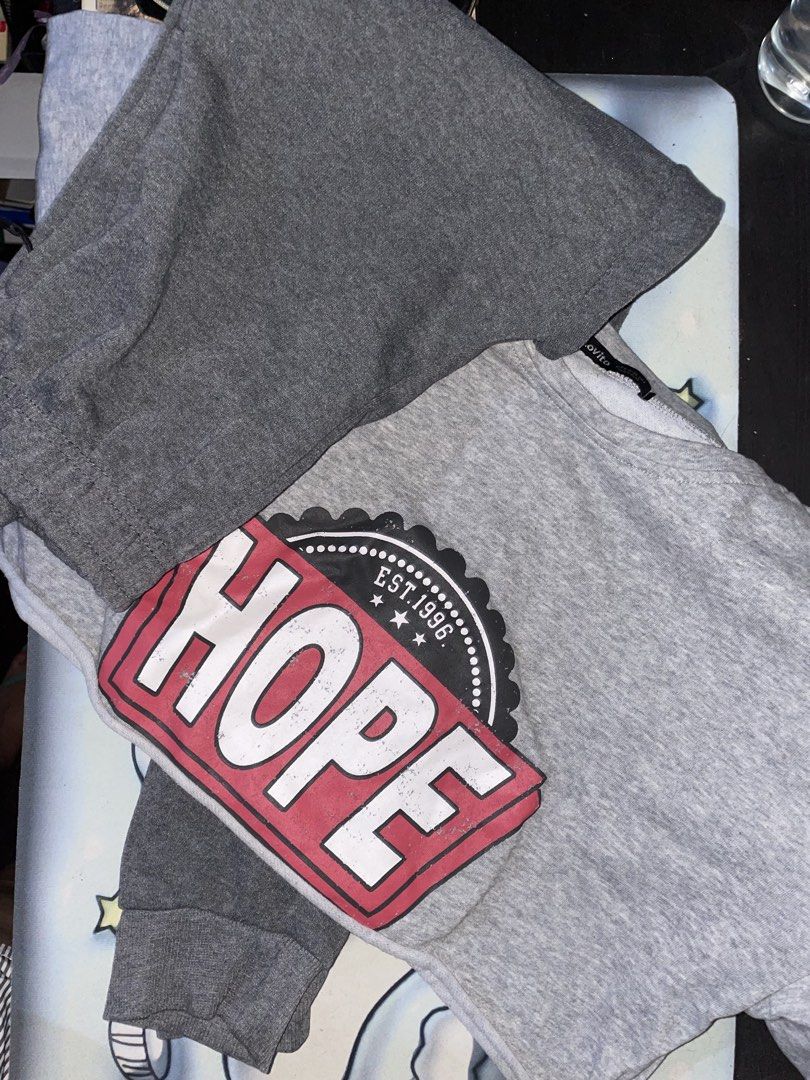 Hope Sweatshirt and Sweatpants Set (Category: Sets or Coordinates) located in Plaridel. Submitted by julien_stuff (Listing ID 1437691283, Image 1). Description: - Levito gray sweatshirt and sweatpants set. - Sweatshirt features a "HOPE" graphic and brand name. - Sweatpants have a simple design with a zipper pocket. - Made from comfortable fabric. - Ideal for casual wear..