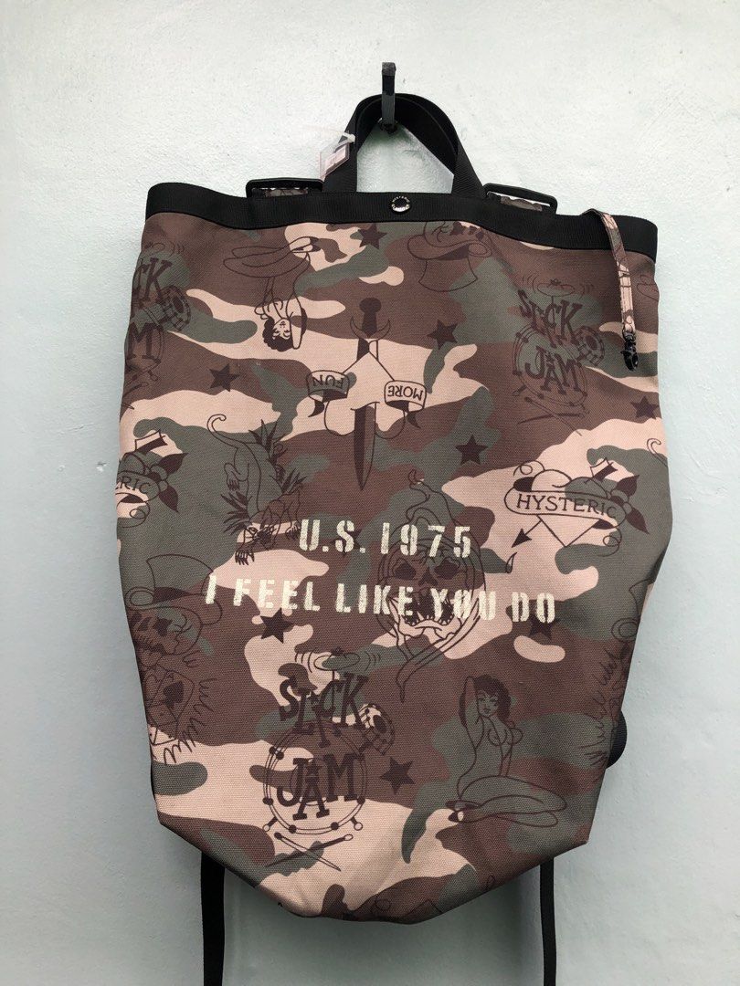 Hysteric Glamour Camo 2 Way Backpack/Sling (Category: Backpacks) located in Muntinlupa City. Submitted by afterclass_ph (Listing ID 1437605585, Image 1). Description: slight scratches see pic for more details can provide more pics upon request needs wash.