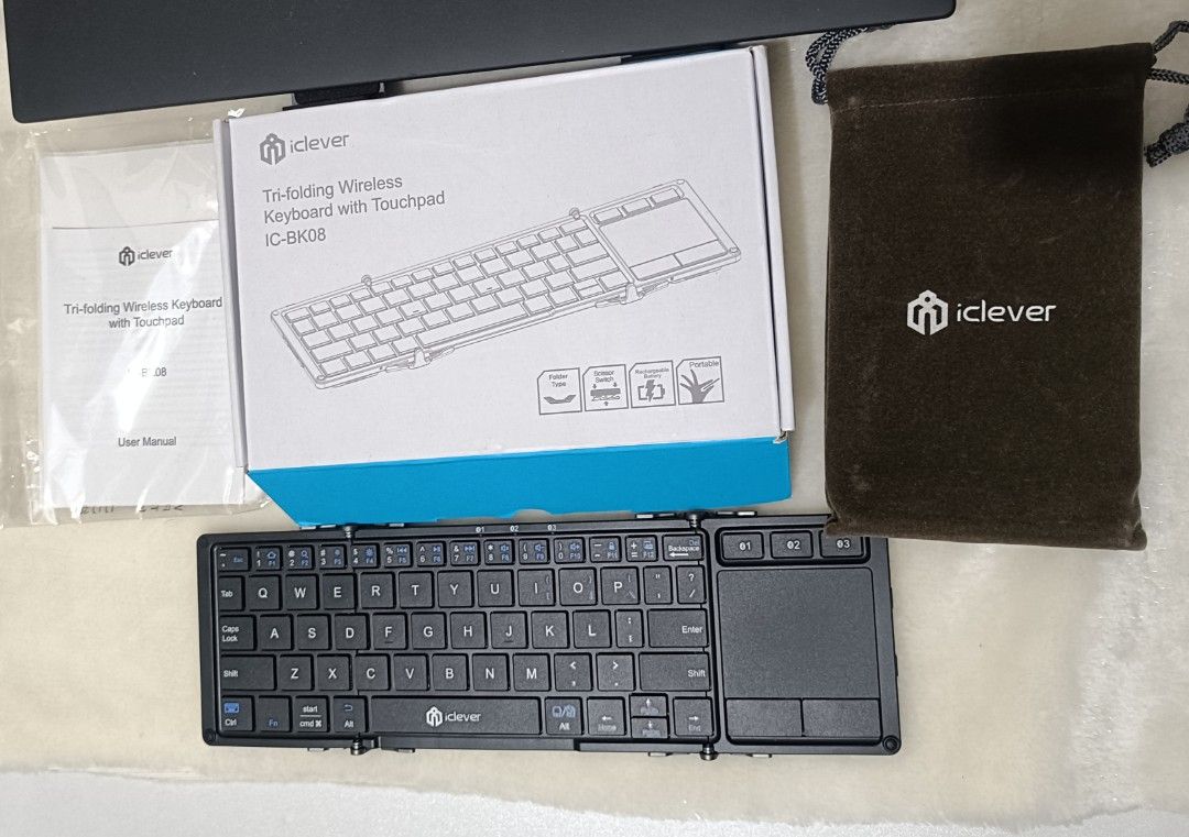 iClever Tri-folding Wireless Keyboard IC-RK08 (Category: Computer Keyboard) located in Cavite. Submitted by default.introvert29 (Listing ID 1437612430, Image 1). Description: - iClever Tri-folding Wireless Keyboard (Model: IC-RK08) - Integrated touchpad - Comes with user manual and carrying pouch - Includes original box - Sleek black design ‼️LIKE NEW‼️ - TRI FOLD KEYBOARD - POCKET SIZE - CAN CONNECT 3 DEVICES - USED ONCE - NO ISSUE ⚠️ NEGOTIABLE