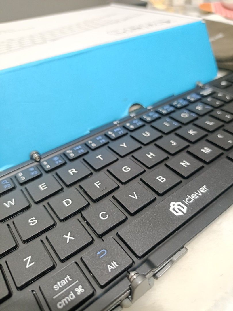 iClever Tri-folding Wireless Keyboard IC-RK08 (Category: Computer Keyboard) located in Cavite. Submitted by default.introvert29 (Listing ID 1437612430, Image 2). Description: - iClever Tri-folding Wireless Keyboard (Model: IC-RK08) - Integrated touchpad - Comes with user manual and carrying pouch - Includes original box - Sleek black design ‼️LIKE NEW‼️ - TRI FOLD KEYBOARD - POCKET SIZE - CAN CONNECT 3 DEVICES - USED ONCE - NO ISSUE ⚠️ NEGOTIABLE