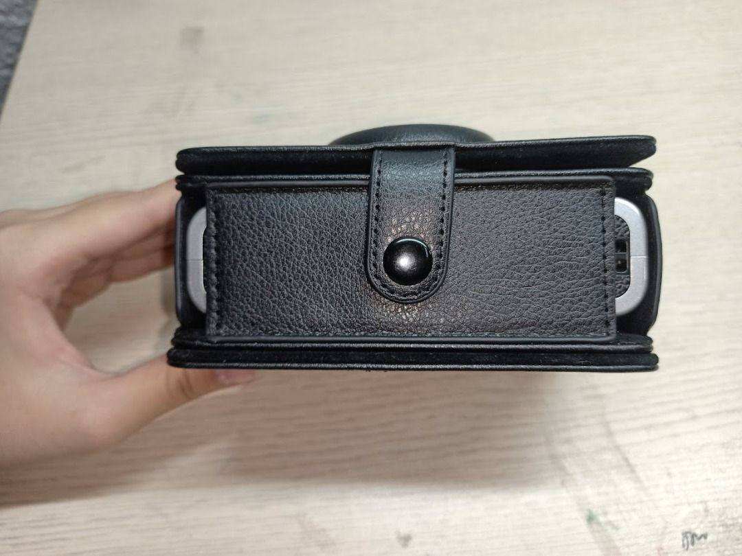 Instax Mini Evo black case magnetic cover flip (Category: Other Accessories) located in Malolos. Submitted by kairo5_ (Listing ID 1437628715, Image 1). Description: RFS: Accidentally bought two Price can be negotiated accepting Gcash only my experience with the case itself is very good, a hassle if you're gonna take pictures and the cover is just hanging... I suggest detached pag mag ppictures, attatched when kept away. Metal camera cover not inc
